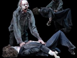 ZMB505- Kneeling Zombie Lunger with Victim